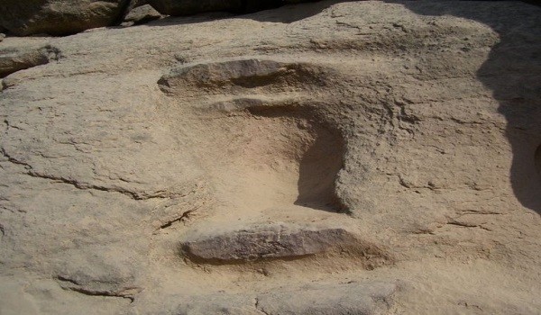 Serpent Yoni-Lingam engraved on rock at Peepal Dhoro