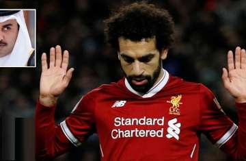 محمد صلاح وفي الإطار تميم حاكم قطر