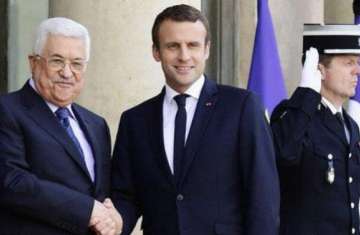 الرئيس الفلسطيني محمود عباس وماكرون 