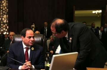 عباس كامل والرئيس السيسي