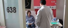 An oncologist consults with a cancer patient at a hospital in Lyon, France. Photo: WHO